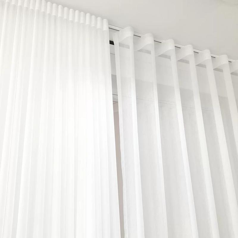 Szycie i wykończenie zasłon na taśmie wave