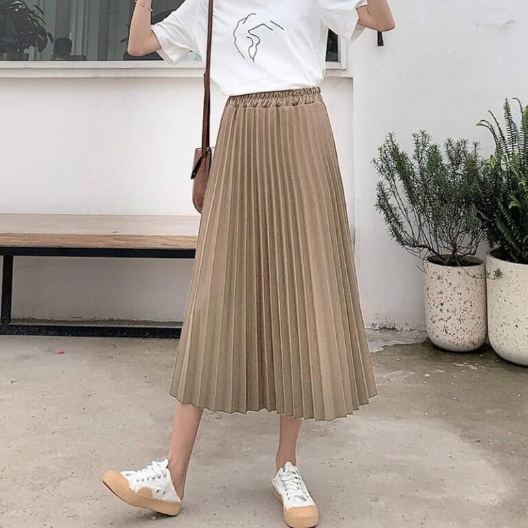 Stylowe sposoby na to, jak nosić spódnice midi zimą