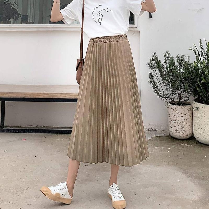 Stylowe sposoby na to, jak nosić spódnice midi zimą